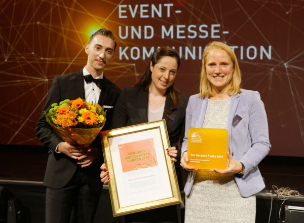 Glückliche Gewinner: Der "Goldene Funke" geht an das Münchner Büro der Vok Dams. Foto:  mhvogel.de