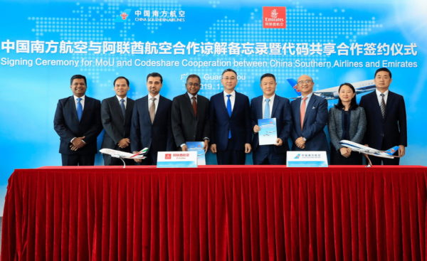 Executives from Emirates and China Southern at the signing ceremony for a codeshare agreement between the two airlines